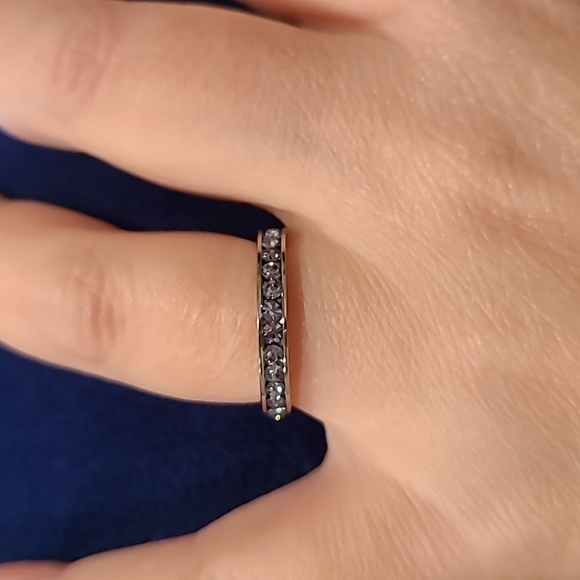 Light blue cubic zirconia channel set eternity stainless steel ring - Picture 3 of 7